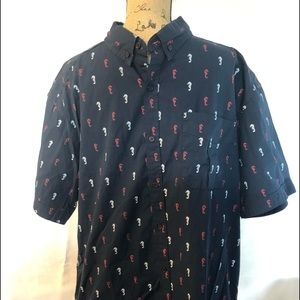 Man’s shirt color Navy blue with figures